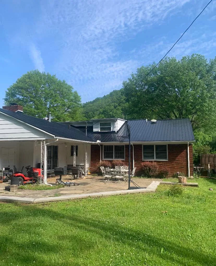 Matte black metal roof with patio