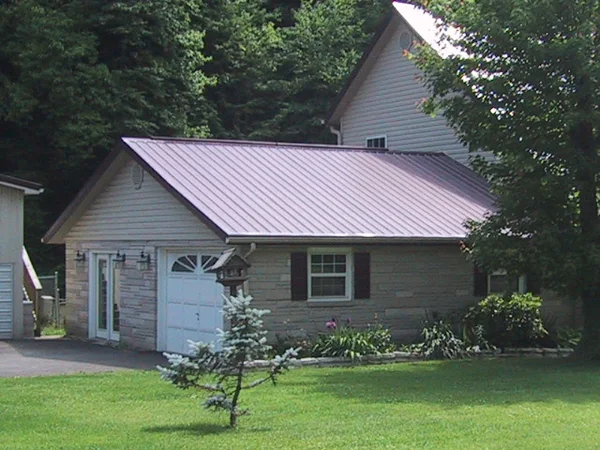 Burgundy roof on detached garage